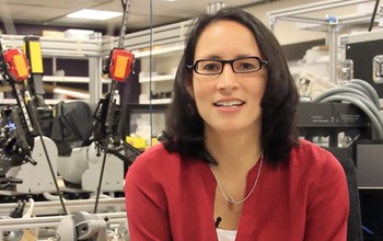 Allison Okamura with robots in a lab